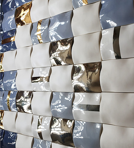 Detail of 3D feature wall as displayed during Design Days Dubai 2016. 108 tiles, high-gloss glazes, gold & platinum enamel